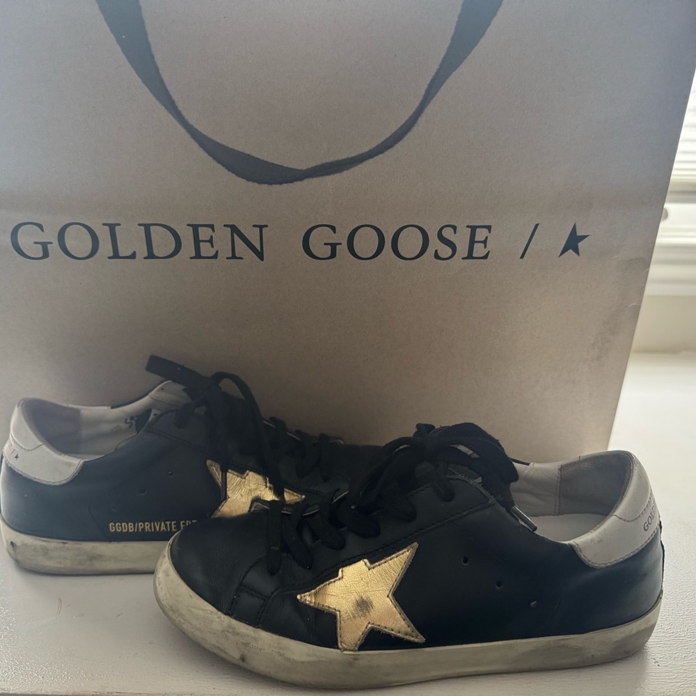 Golden Goose Black and Gold Star Sneakers